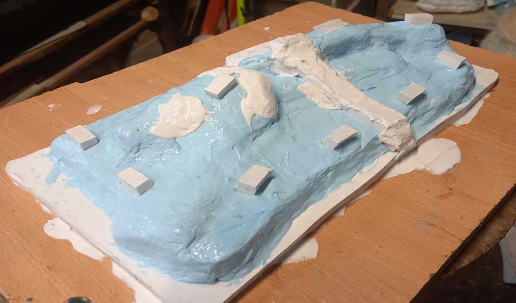 Moulage couche de renfort